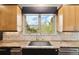Kitchen features granite counters, a stainless steel sink and mountain views at 20413 Bald Mountain Ct, Monument, CO 80132