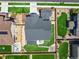 An aerial view of a well-maintained home with a spacious backyard and patio area at 434 W 128Th Dr, Westminster, CO 80234