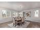 Dining room with a modern chandelier, large window, and elegant decor at 434 W 128Th Dr, Westminster, CO 80234