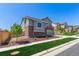 A modern two-story home with brick and siding accents, complemented by fresh landscaping and a well-kept lawn at 434 W 128Th Dr, Westminster, CO 80234