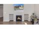 A modern fireplace with decorative niches, providing a focal point in this open-concept living space at 434 W 128Th Dr, Westminster, CO 80234