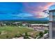 Breathtaking aerial view showcasing the building's location with city skyline and open fields at 7600 Landmark Way # 1514, Greenwood Village, CO 80111