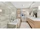 Modern bathroom with tiled walk-in shower, soaking tub, and double vanity for a spa-like experience at 7600 Landmark Way # 1514, Greenwood Village, CO 80111
