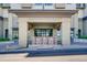 The Landmark East entrance features contemporary brick architecture and well-kept landscaping at 7600 Landmark Way # 1514, Greenwood Village, CO 80111