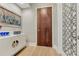 A bright and stylish entryway featuring modern decor, sleek lines, and elegant wood flooring at 7600 Landmark Way # 1514, Greenwood Village, CO 80111