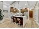 Modern kitchen with sleek countertops, stainless steel appliances, and stylish breakfast bar seating at 7600 Landmark Way # 1514, Greenwood Village, CO 80111