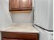 Functional laundry area with countertop and storage cabinets at 7600 Landmark Way # 1514, Greenwood Village, CO 80111