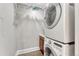 Efficient laundry area featuring a stacked washer and dryer unit at 7600 Landmark Way # 1514, Greenwood Village, CO 80111