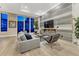 Living room boasts ample natural light, sophisticated decor, and an elegant fireplace at 7600 Landmark Way # 1514, Greenwood Village, CO 80111