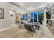 Spacious living area featuring a decorative fireplace and floor-to-ceiling windows at 7600 Landmark Way # 1514, Greenwood Village, CO 80111