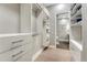 Spacious walk-in closet with custom shelving and storage solutions for all wardrobe needs at 7600 Landmark Way # 1514, Greenwood Village, CO 80111