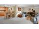 Finished basement area with kitchenette, seating area, and ample space for entertainment at 13781 E Marina Dr # A, Aurora, CO 80014