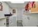 Functional laundry room with ample storage space and modern appliances at 13781 E Marina Dr # A, Aurora, CO 80014