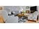 Cozy living room with fireplace, plush seating, stylish decor, and ample natural light at 13781 E Marina Dr # A, Aurora, CO 80014