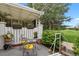 Charming patio area with lovely golf course views and comfortable seating at 13781 E Marina Dr # A, Aurora, CO 80014