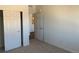 Spacious bedroom with double door closet and neutral carpeting at 15700 E Jamison Dr # 5-307, Englewood, CO 80112