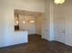 Bright dining area with hardwood floors and an open kitchen at 15700 E Jamison Dr # 5-307, Englewood, CO 80112