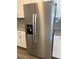 Stainless steel Whirlpool refrigerator with ice and water dispenser at 15700 E Jamison Dr # 5-307, Englewood, CO 80112