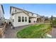 Backyard with patio, gravel, and view of neighborhood at 1101 E Witherspoon Dr, Elizabeth, CO 80107