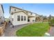 This home has a well-manicured lawn and wooden fence providing privacy and a nice patio for entertaining at 1101 E Witherspoon Dr, Elizabeth, CO 80107