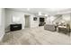 Finished basement with modern gray finishes and a cozy entertainment area at 1101 E Witherspoon Dr, Elizabeth, CO 80107