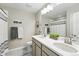 Bathroom featuring double sinks with modern fixtures, a large mirror, and ample counter space at 1101 E Witherspoon Dr, Elizabeth, CO 80107
