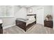 A well-lit bedroom with plush carpeting and stylish decor at 1101 E Witherspoon Dr, Elizabeth, CO 80107