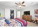 Bright bedroom features a large closet and dresser, perfect for storage and organization at 1101 E Witherspoon Dr, Elizabeth, CO 80107