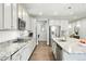 Well-lit kitchen featuring granite countertops, modern appliances and an undermount sink at 1101 E Witherspoon Dr, Elizabeth, CO 80107