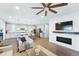 Open-concept living space connecting the living room to the kitchen, perfect for entertaining at 1101 E Witherspoon Dr, Elizabeth, CO 80107