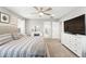 Spacious main bedroom featuring an ensuite bathroom, vanity, and large windows, offering comfort and style at 1101 E Witherspoon Dr, Elizabeth, CO 80107