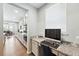 Office space with granite countertops, built in desk and modern computer setup at 1101 E Witherspoon Dr, Elizabeth, CO 80107