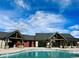 Community clubhouse with a luxurious outdoor pool, perfect for relaxation and recreation at 1101 E Witherspoon Dr, Elizabeth, CO 80107