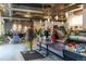 Interior view of a modern coffee shop featuring a service counter, seating area, and decorative lighting at 1652 N Lafayette St # 1, Denver, CO 80218