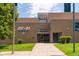 Exterior shot of DC-21 Middle & High School featuring a tidy entrance with green landscaping at 1652 N Lafayette St # 1, Denver, CO 80218