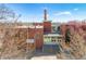 Exterior view of Whittier School with a well-maintained brick facade and landscaping at 1652 N Lafayette St # 1, Denver, CO 80218