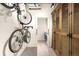 Storage area featuring bike racks, laundry area, and wood cabinets for optimized space at 1925 W 32Nd Ave # 502, Denver, CO 80211