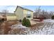 Backyard featuring an attached deck, patio and sparse vegetation at 10463 Adams St, Northglenn, CO 80233