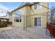 Backyard with deck, pergola, and partial fence at 10463 Adams St, Northglenn, CO 80233