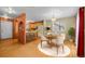 Charming dining area adjacent to kitchen with cozy breakfast nook at 10463 Adams St, Northglenn, CO 80233