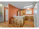 Cozy kitchen with bar seating and ample counter space at 10463 Adams St, Northglenn, CO 80233