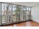 Large windows providing lots of natural light in the tiled enclosed balcony at 350 S Clinton St # 9C, Denver, CO 80247