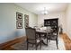 Inviting dining room with hardwood floors, stylish decor, and ample space for entertaining guests at 350 S Clinton St # 9C, Denver, CO 80247