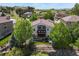 Aerial view showcasing the backyard, playground, deck, and nearby community at 12380 Jasper Pointe Way, Castle Pines, CO 80108