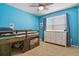 Playful blue bedroom featuring a built-in bunk bed and multicolored dresser at 12380 Jasper Pointe Way, Castle Pines, CO 80108