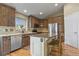Well-equipped kitchen with stainless steel appliances, granite countertops, and a central island at 12380 Jasper Pointe Way, Castle Pines, CO 80108
