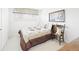 Cozy bedroom with a bed and chair next to a window at 1930 Taft Dr, Lakewood, CO 80215