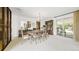Formal dining room with traditional furnishings and a sliding glass door to the outdoor space at 1930 Taft Dr, Lakewood, CO 80215