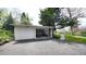 Spacious driveway leading to a two-car garage at 1930 Taft Dr, Lakewood, CO 80215