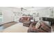 Comfortable living room featuring a patterned sofa, and built-in cabinets at 1930 Taft Dr, Lakewood, CO 80215